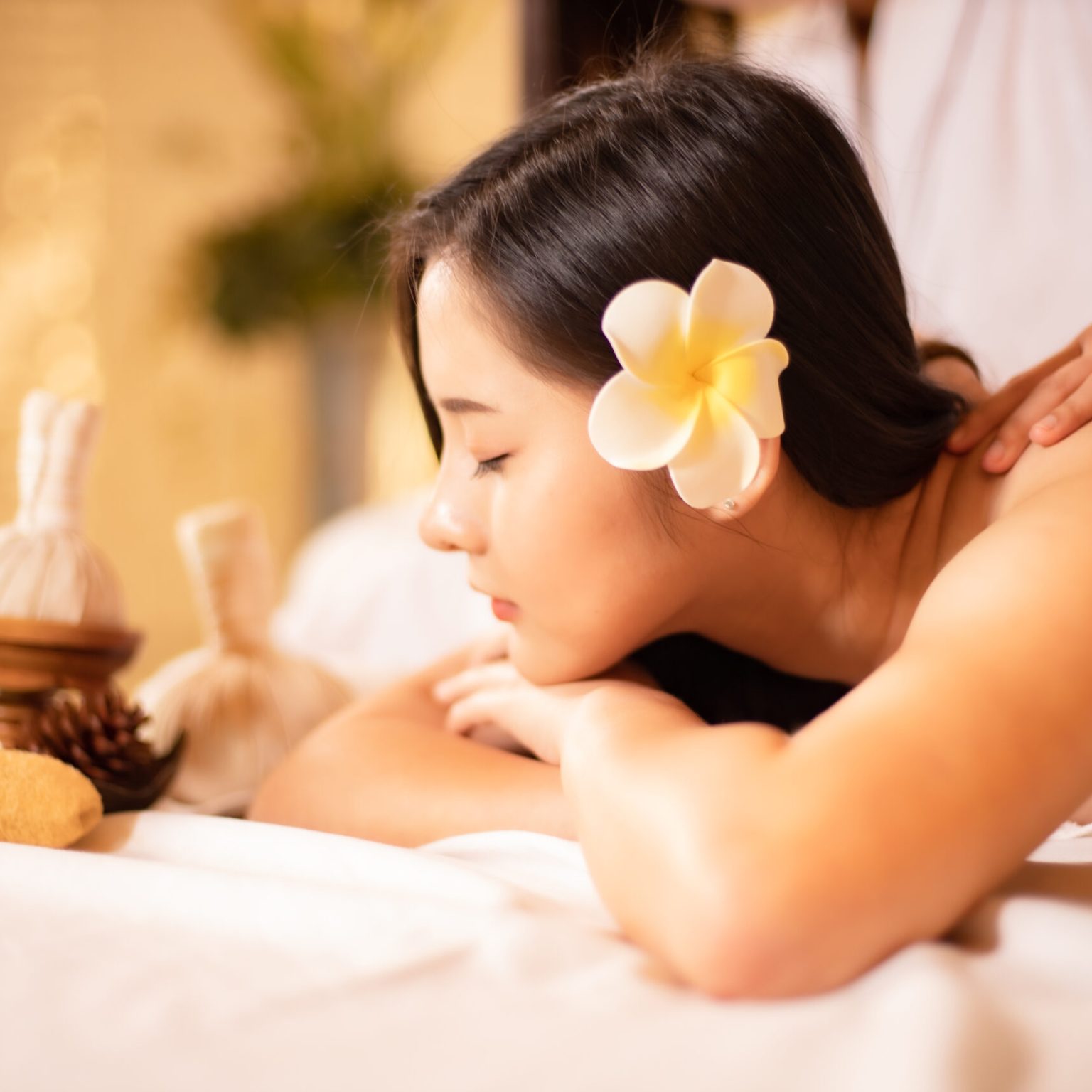 Asian Beautiful, young and healthy woman in spa salon. Massage t